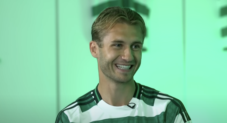 Benjamin Nygren smiles during an interview for Celtic TV inside the dressing room
