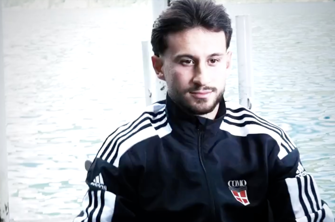 Nicolas Kuhn gets his picture taken in a Como tracksuit after signing for the club from Celtic
