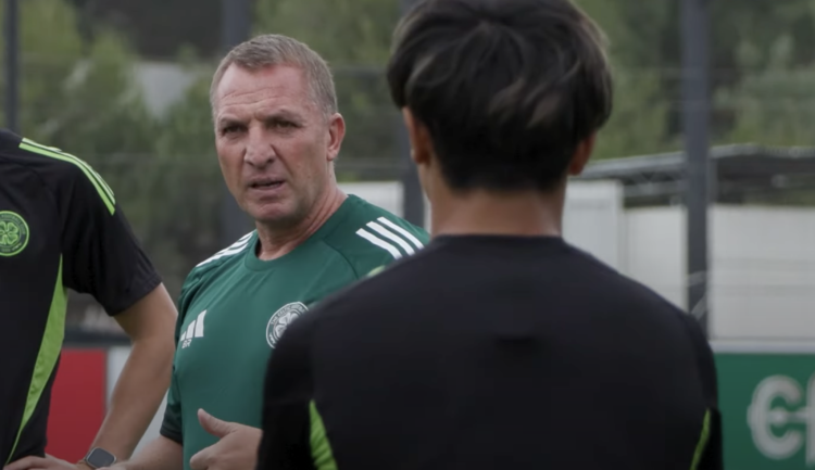 Brendan Rodgers speaks to his Celtic players at the Benfica Campus in Lisbon
