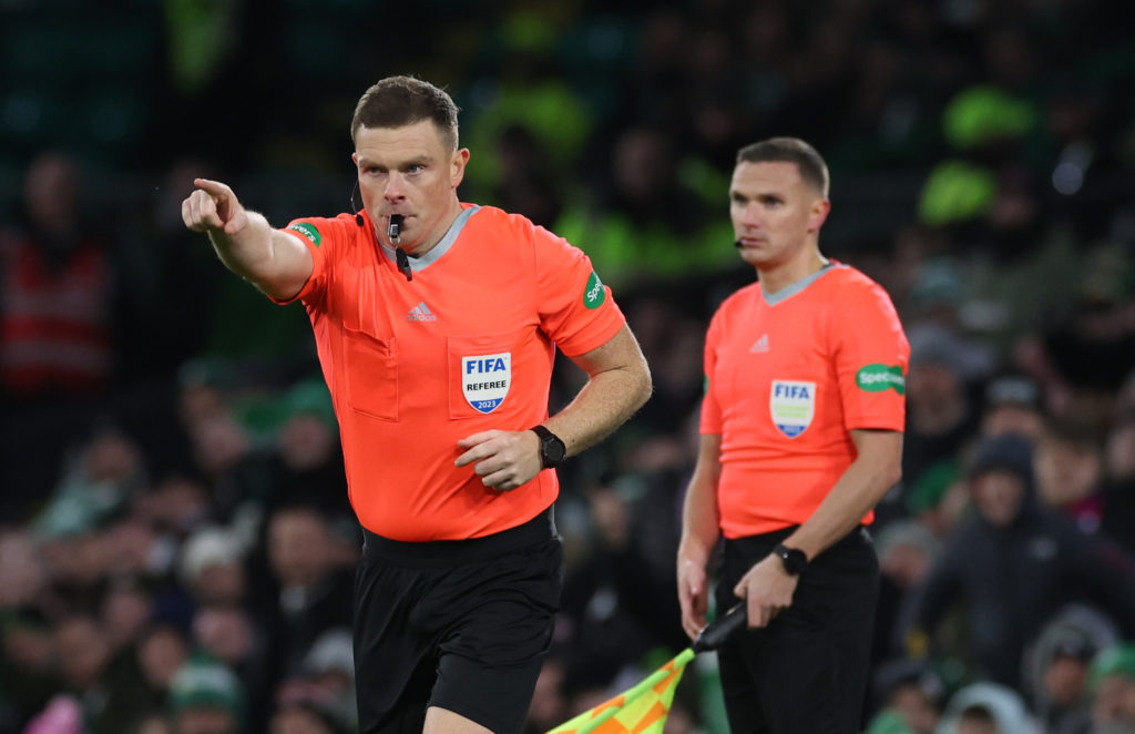 John Beaton awards Celtic a penalty following a VAR check against Hibernian