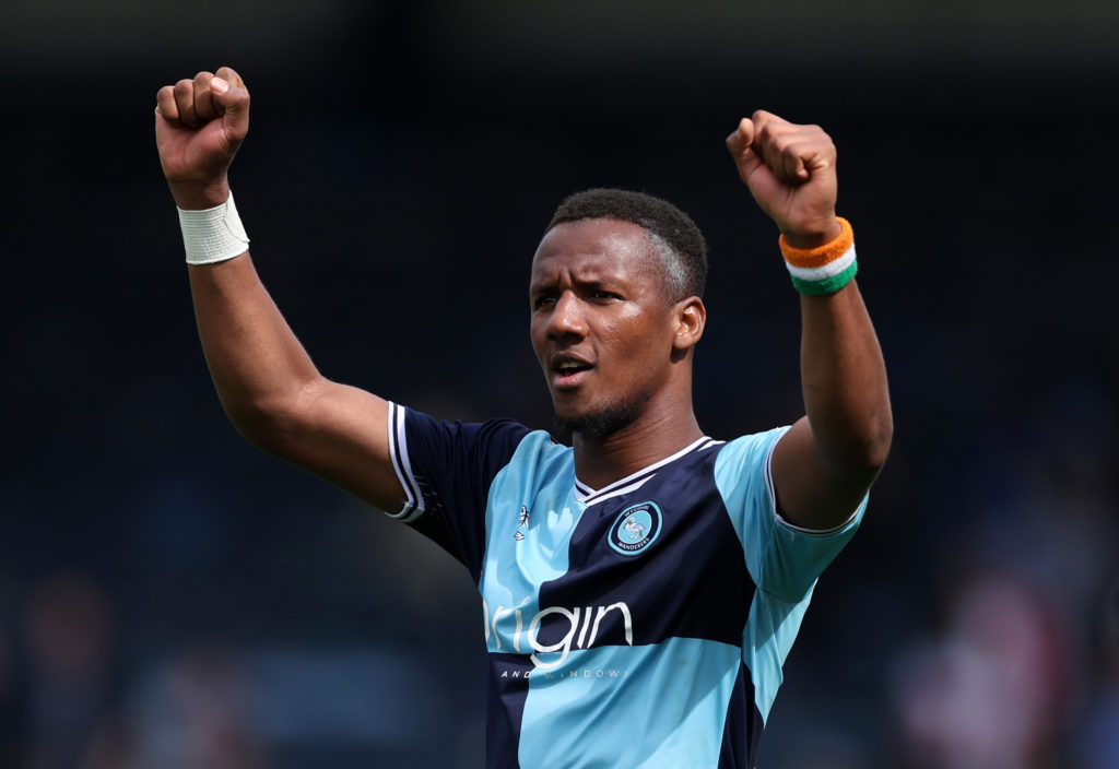 Richard Kone of Wycombe Wanderers celebrates victory after beating Stevenage