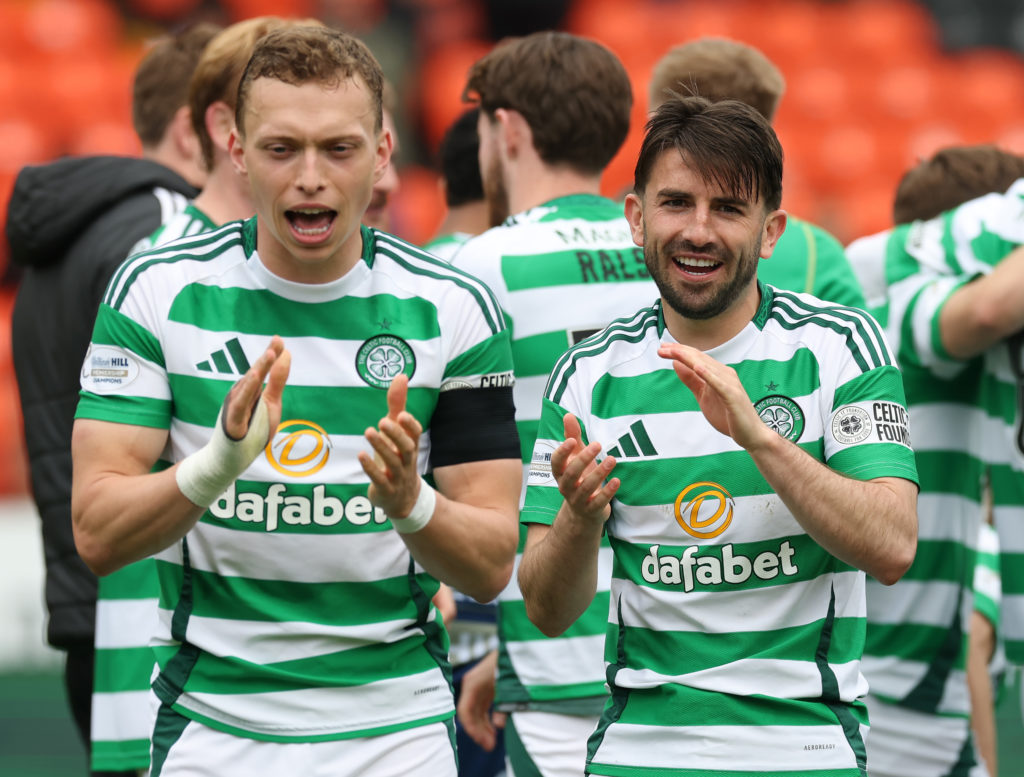 Alistair Johnston of Celtic and Greg Taylor of Celtic are seen at full time during the SPL | Premier League match between Dundee United FC and Celtic FC at Tannadice Park