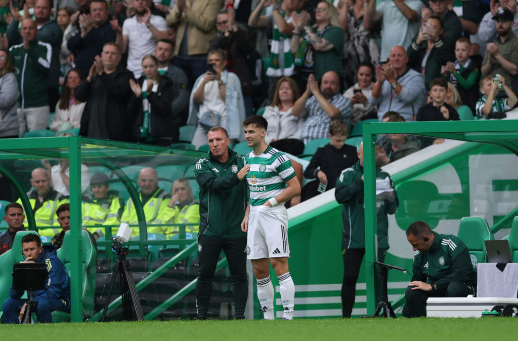 Celtic player Kieran Tierney is embraced by manager Brendan Rodgers before coming on as a substitute during the pre-season friendly match between Celtic and Newcastle United at Celtic Park