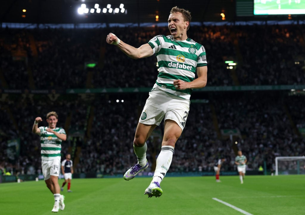 Alistair Johnston of Celtic celebrates scoring his team's second goal during the Premier Sports League Cup match between Celtic and Falkirk at Celtic Park