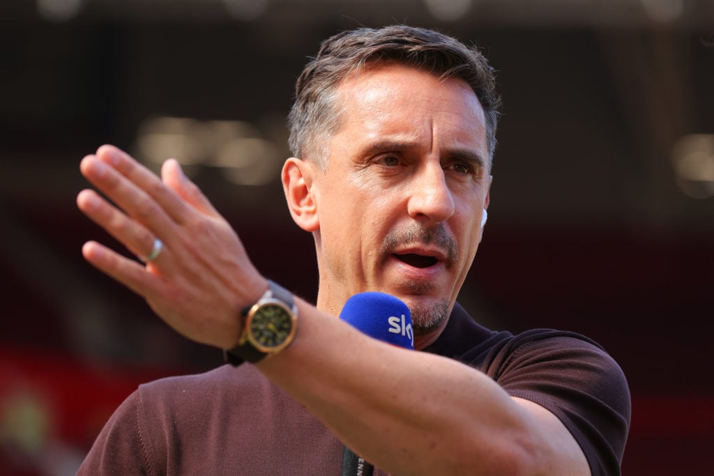 Sky Sports pundit Gary Neville presents to camera ahead of the Premier League match between Manchester United and Arsenal at Old Trafford