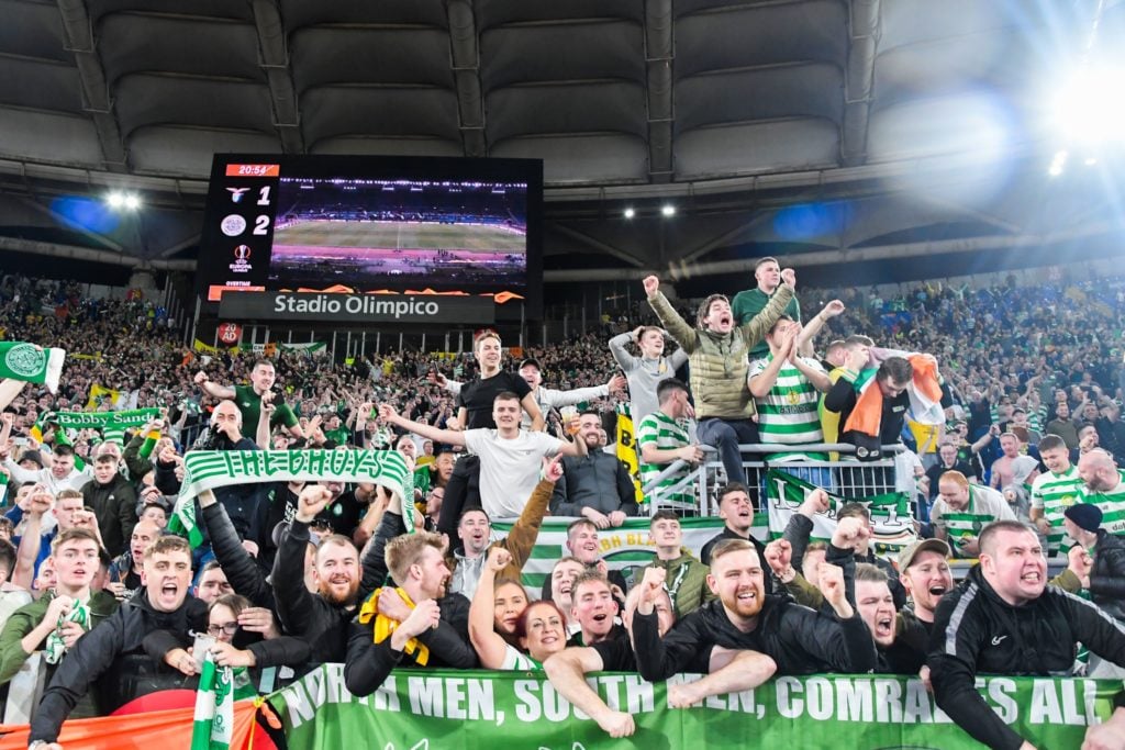Celtic fans celebrate their team's victory at the end of the UEFA Europa League Group E football match Lazio vs Celtic