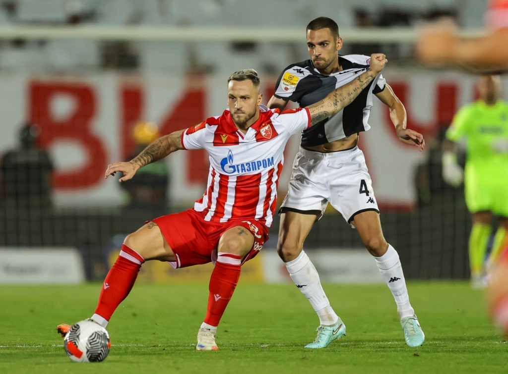 Marko Arnautovic holds the ball during Partizan Belgrade vs Red Star Belgrade