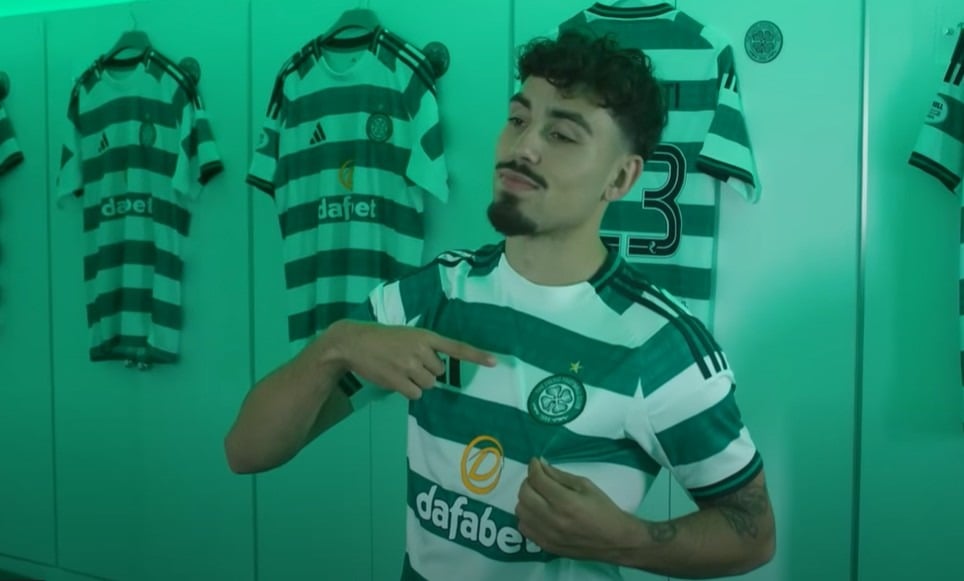 Sebastian Tounekti looking proud pointing at the Celtic badge during his Celtic announcement.