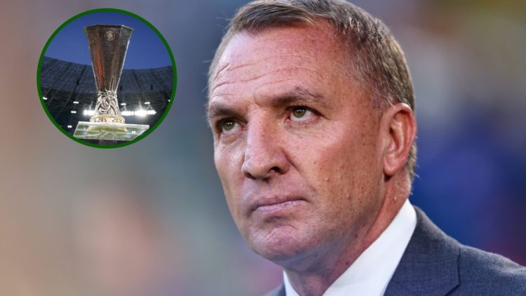 Image of Celtic boss Brendan Rodgers looking up at the Europa League trophy.