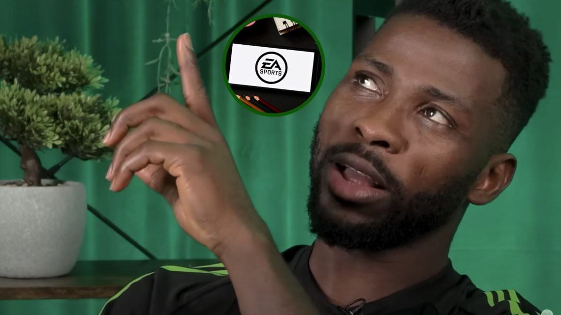 Image of Celtic striker Kelechi Iheanacho looking up at the EA Sports logo for the release of FC 26.