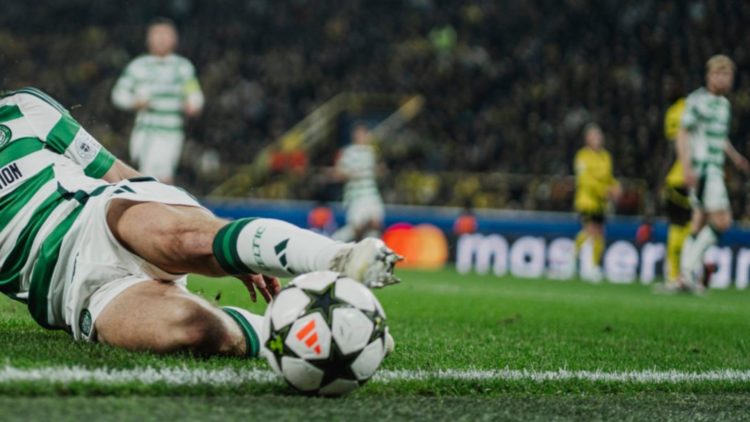 Greg Taylor of Celtic Glasgow reaches out for the ball during the UEFA Champions League 2024/25 League Phase MD6 match between Borussia Dortmund an...