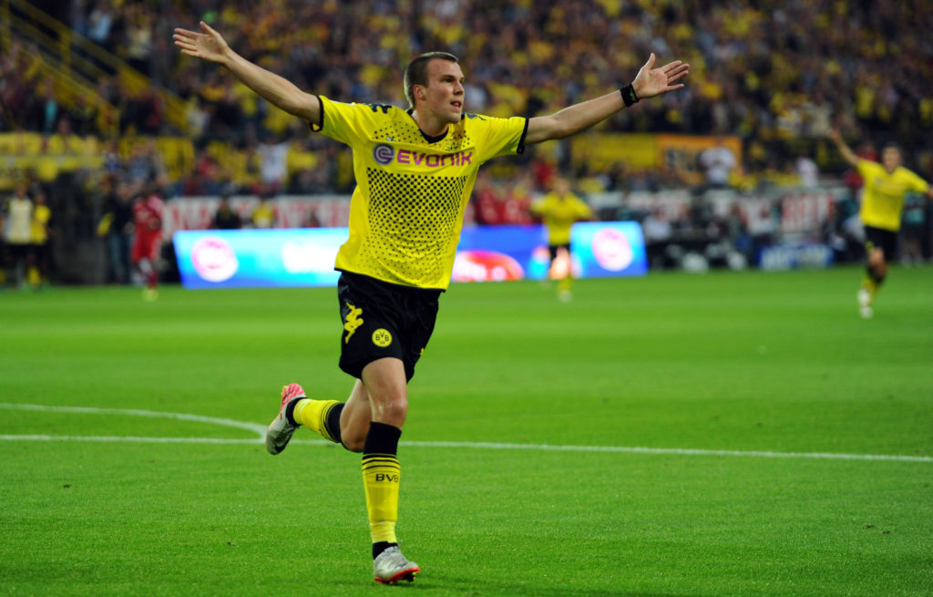 Kevin Grosskruetz celebrates his goal for Borussia Dortmund against Hamburg in the Bundesliga