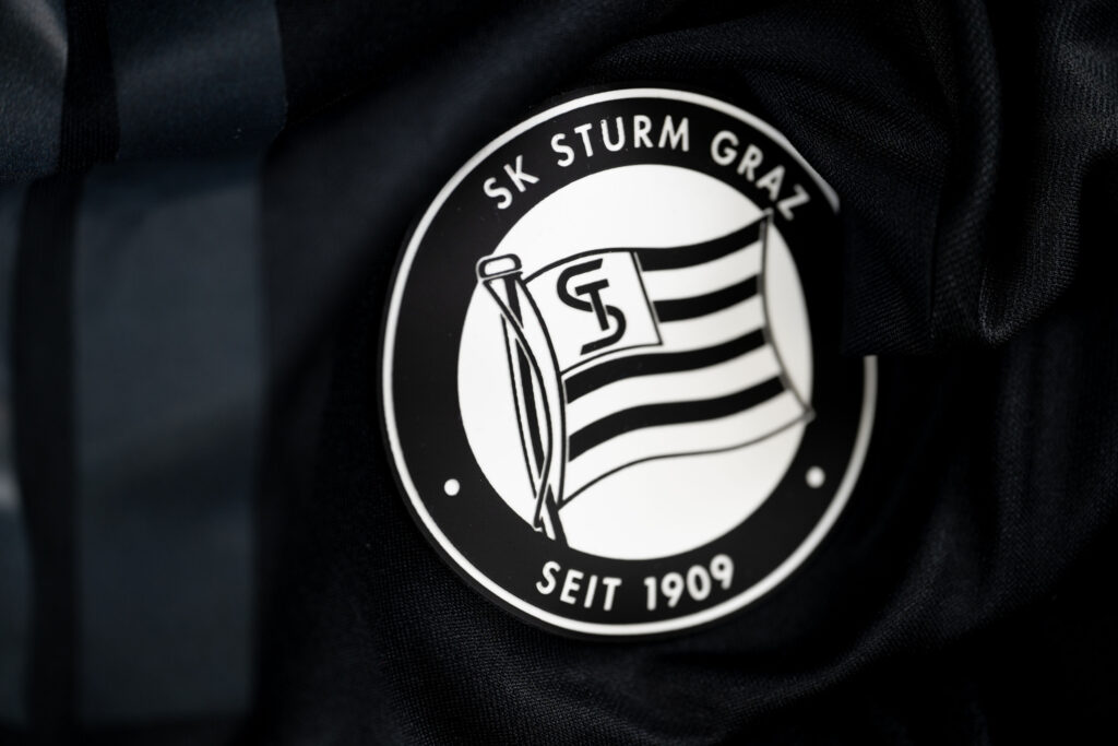 A detailed view of the badge of SK Sturm Graz during the UEFA Champions League 2024/25 League Phase Jerseys Shoot at the UEFA Headquarters
