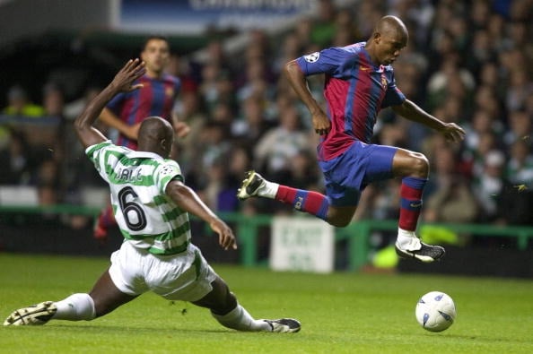 Samuel Eto'o escapes a tackle from Bobo Balde during Celtic vs Barcelona in the Champions League
