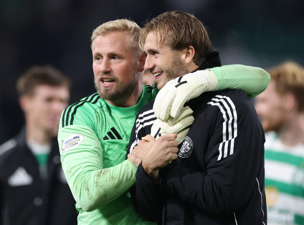 Kasper Schmeichel embraces Benjamin Nygren after Celtic's win against Falkirk