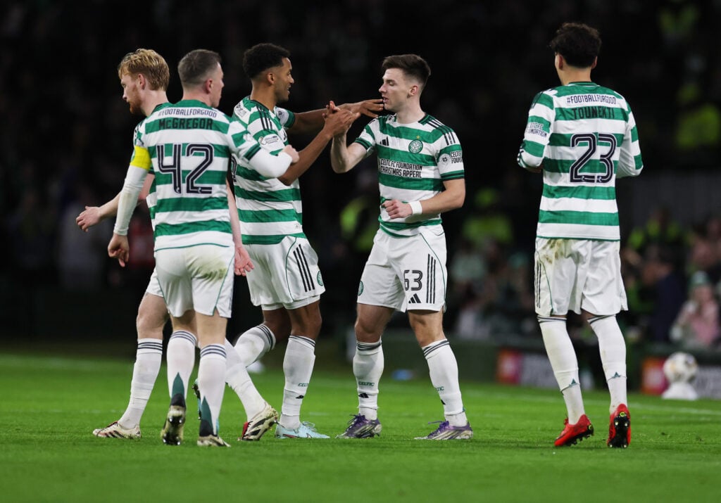Kieran Tierney of Celtic is congratulated by team mates after he scores his team's second goal during the Premier League match between Celtic and Kilmarnock