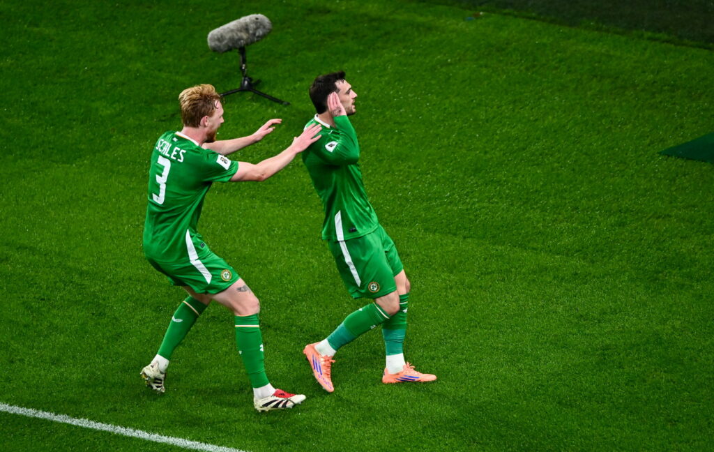 Liam Scales goes to congratulate Troy Parrott after his goal for Republic of Ireland against Portugal
