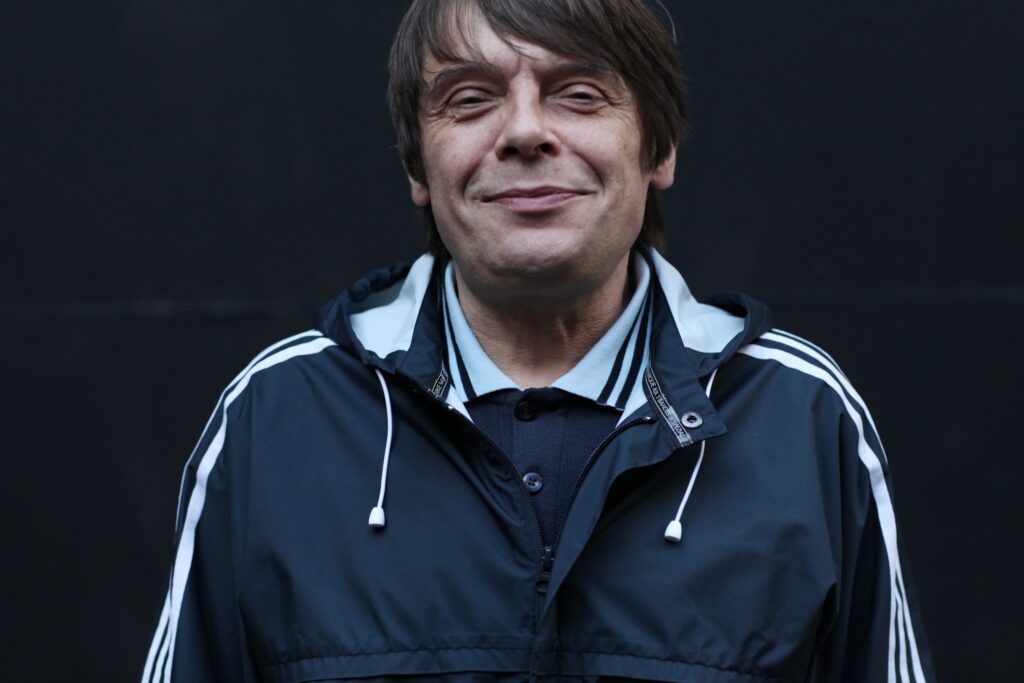 Stone Roses and Primal Scream bassist Gary 'Mani' Mounfield poses for a photo