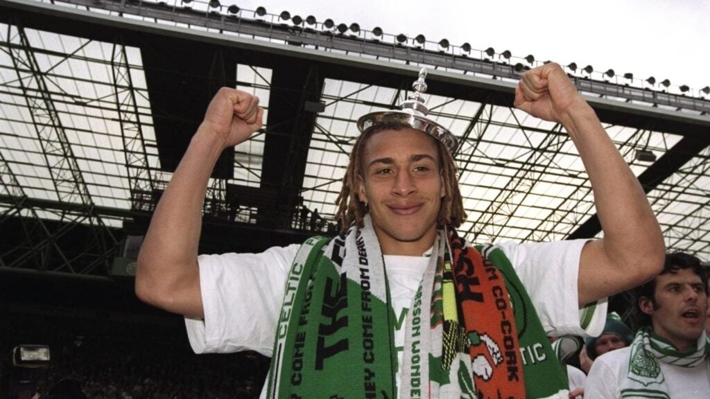 Henrik Larsson of Celtic celebrates after a Scottish Premier League match against St Johnstone at Celtic Park
