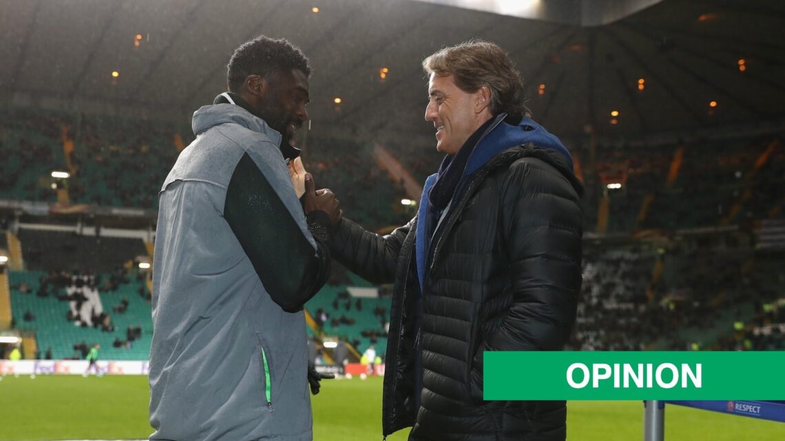 Roberto Mancini embraces Kolo Toure at Parkhead, with an opinion banner.