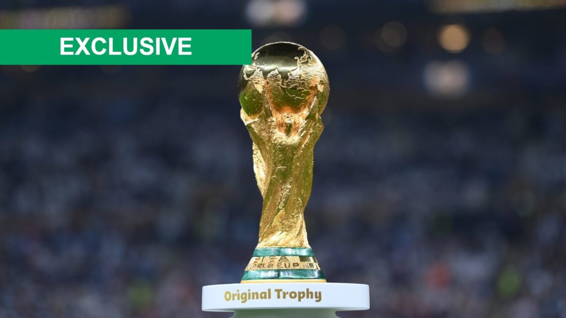 Image of the World Cup trophy with a Celtic-themed exclusive banner.