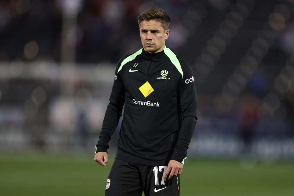 Cameron Devlin warms up before Australia's friendly against the USA