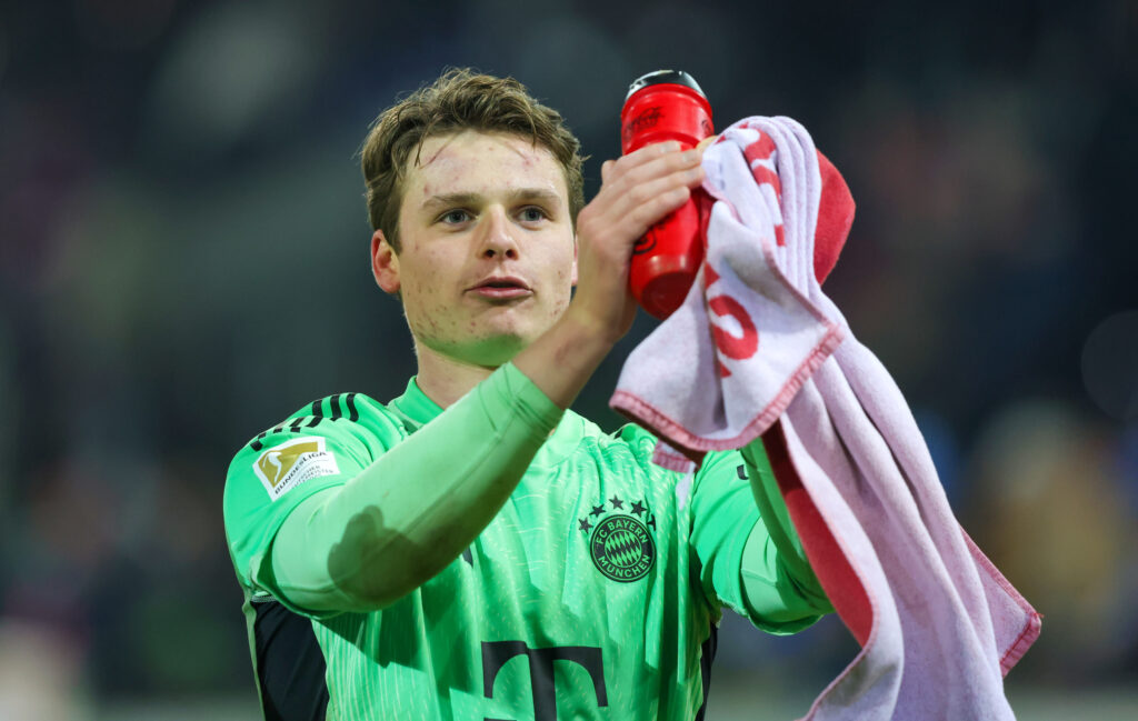 Jonas Urbig of FC Bayern München celebrates the victory after the Bundesliga match between 1. FC Heidenheim 1846 and FC Bayern München