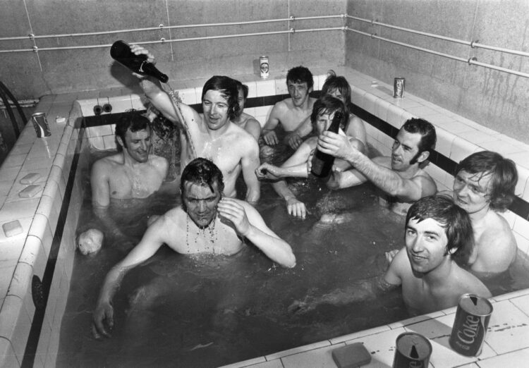 TBC Dixie Deans had a double reason to celebrate as he pours a champagne shampoo for his team mate Bobby Murdoch