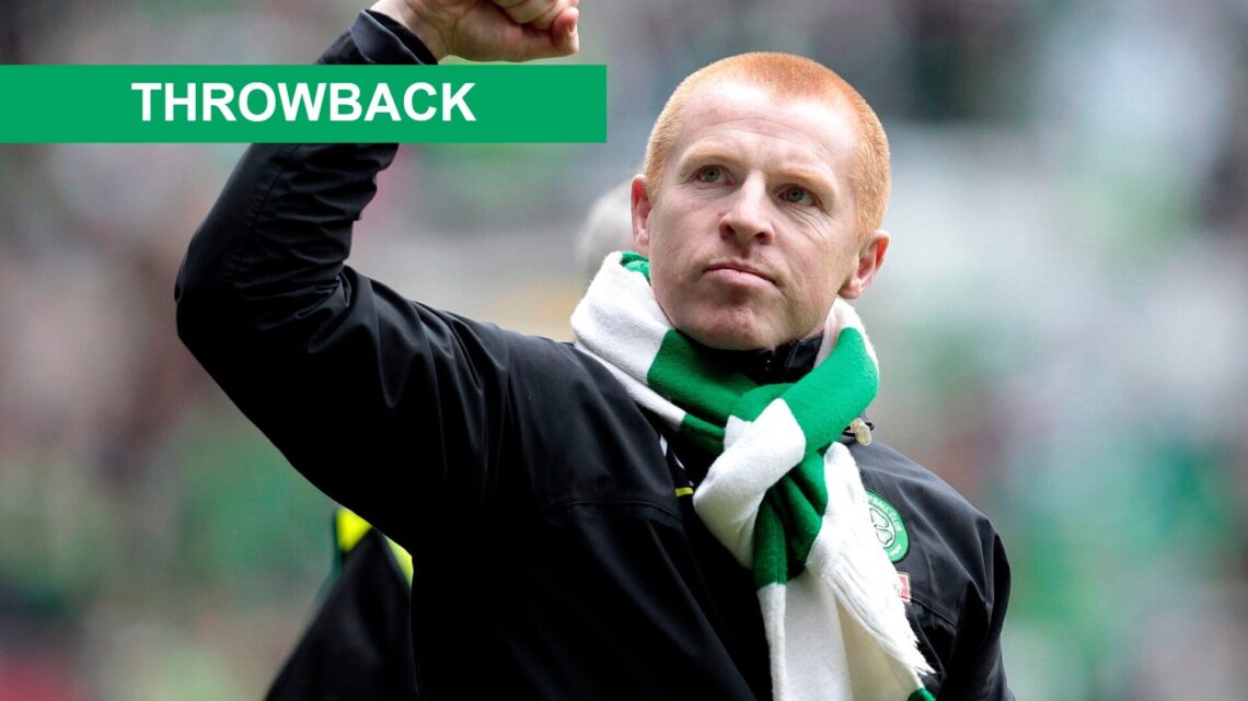 Celtic's manager, Neil Lennon, pumps a fist in the air after his team wins 4-0 in their Scottish Premier League football match against Motherwell