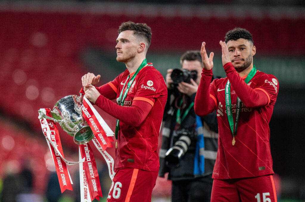 Andrew Robertson and Alex Oxlade-Chamberlain of Liverpool celebrates after winning the Carabao Cup
