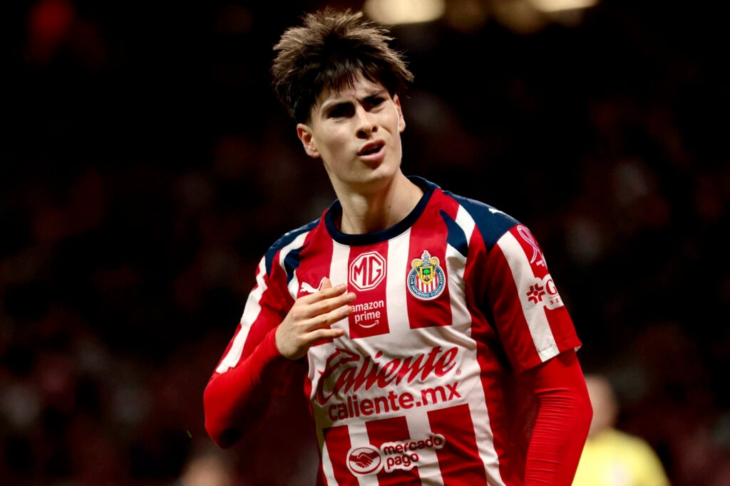 Armando Gonzalez celebrates scoring his team's fourth goal during the Liga MX Apertura football match between Guadalajara and Atlas