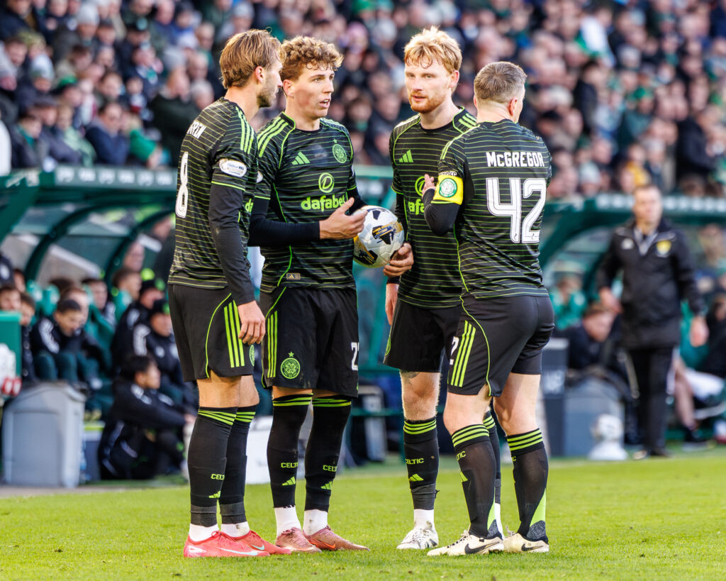 Celtic players discussing freekick options during Hibs vs Celtic