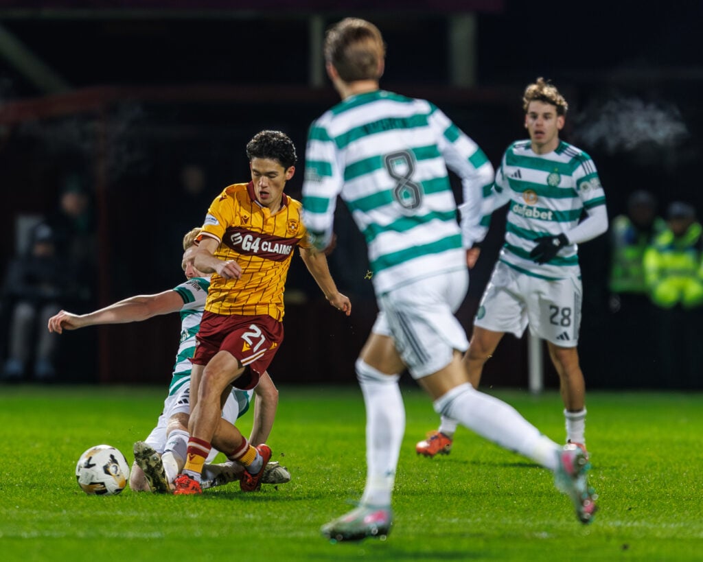 Liam Scales of Celtic tackles Elijah Just of Motherwell during the Premier League match between Motherwell and Celtic