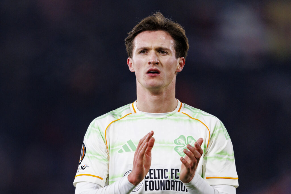 Johnny Kenny of Celtic FC thanks supporters for standing following the UEFA Europa League