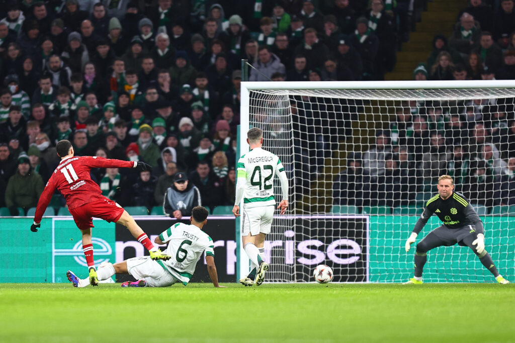 Bilal El Khannouss scores for VfB Stuttgart against Celtic in the Europa League playoff first-leg at Parkhead, with Auston Trusty, Kasper Schmeichel and Callum McGregor watching on.