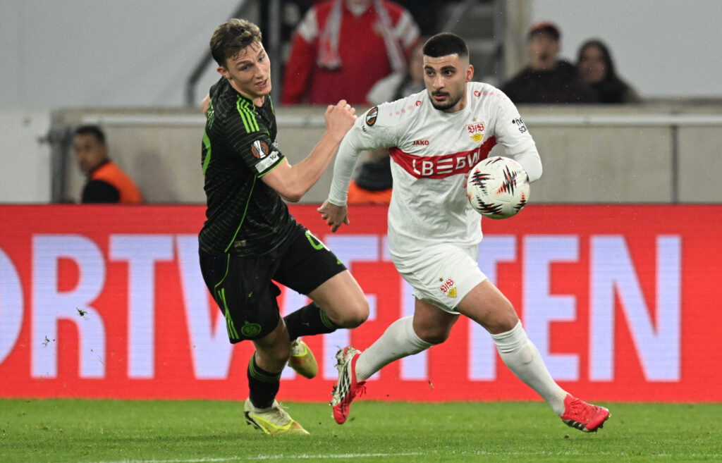 Dane Murray (L) and Stuttgart's German forward #26 Deniz Undav vie for the ball
