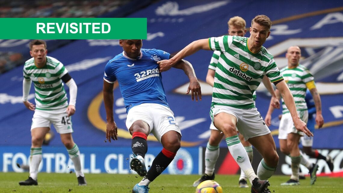 Alfredo Morelos of Rangers shoots under pressure from Kristoffer Ajer of Celtic during the Scottish Cup game between Rangers and Celtic at Ibrox St...