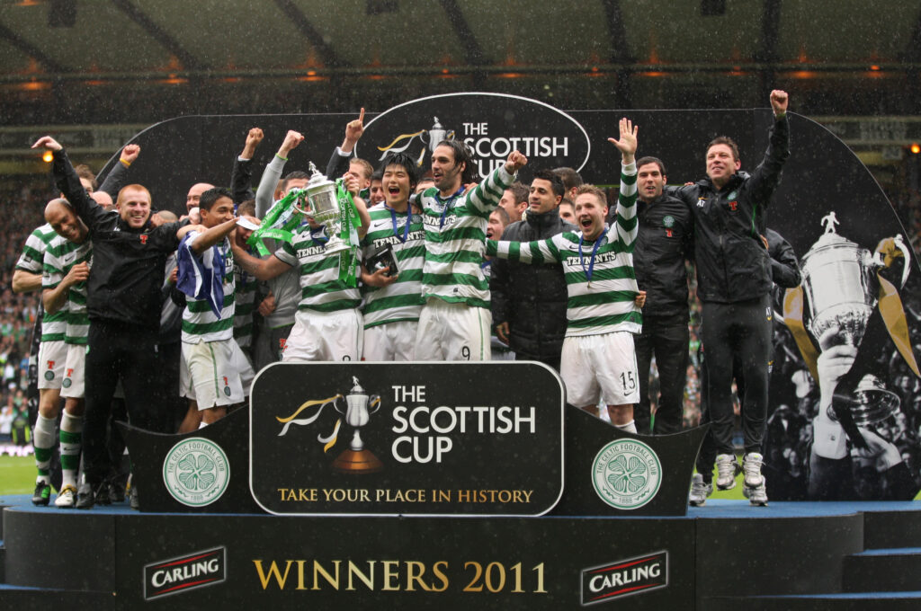 Celtic celebrate winning the Scottish Cup aloft after the final between Celtic and Motherwell, at Hampden Park on May 21, 2011