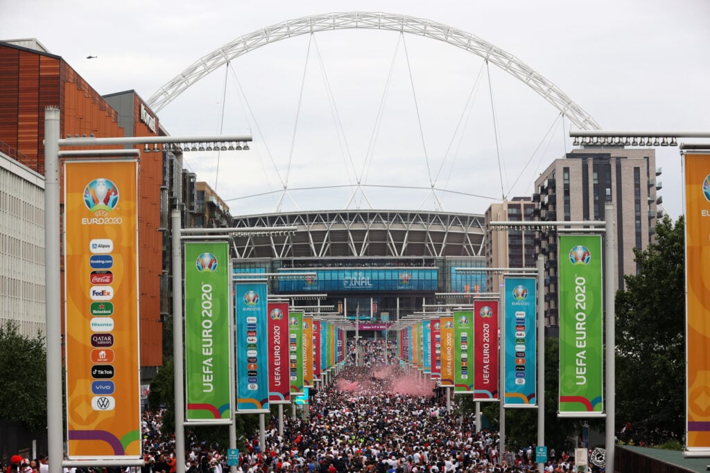 A general view outside the stadium along Wembley Way as fans enjoy the pre match atmosphere prior to the UEFA Euro 2020 Championship Final between Italy and England