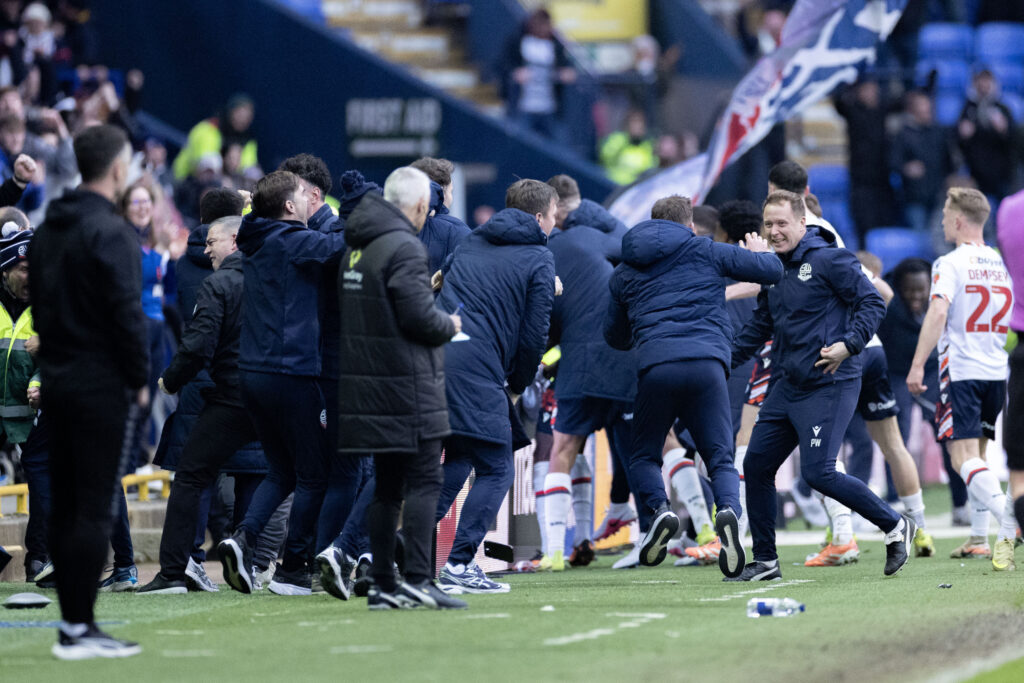 Bolton Wanderers celebrate scoring a late winner against Wycombe Wanderers in Sky Bet League One, with Johnny Kenny in their ranks.