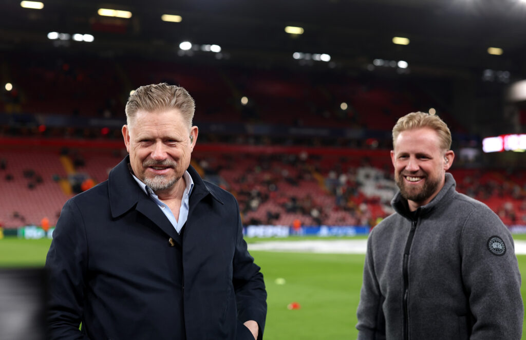 Peter Schmeichel and his son Kasper Schmeichel react prior to the UEFA Champions League 2025/26 Round of 16 Second Leg match between Liverpool FC and Galatasaray