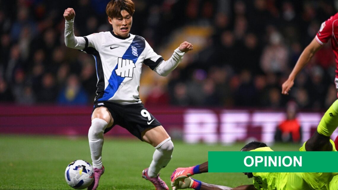 Kyogo Furuhashi of Birmingham City is challenged by Arthur Okonkwo of Wrexham AFC during the Sky Bet Championship match between Wrexham AFC and Bir...