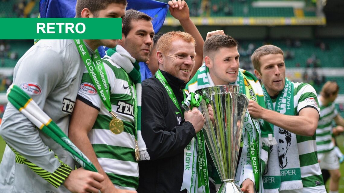 Neil Lennon, coach of Celtic, holds the Clydesdale Bank Premier League trophy