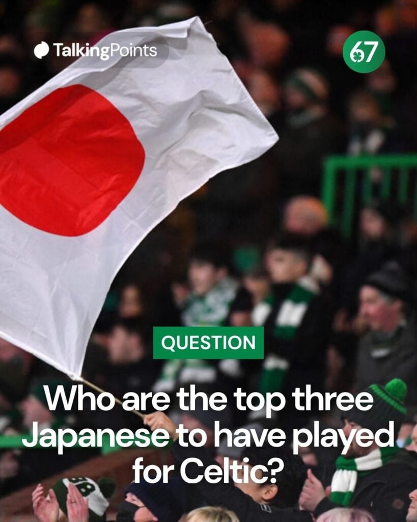 A fan waves a Japanese flag in the crowd as Celtic's Japanese striker Kyogo Furuhashi comes on as substitute during the UEFA Europa League group G football match between Celtic and Real Betis at Celtic Park.