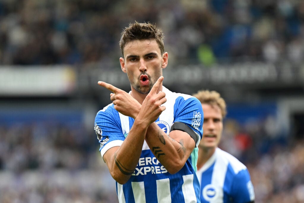 Matt O'Riley of Brighton & Hove Albion celebrates scoring his team's first goal during the Premier League match between Brighton & Hove Albion and Fulham