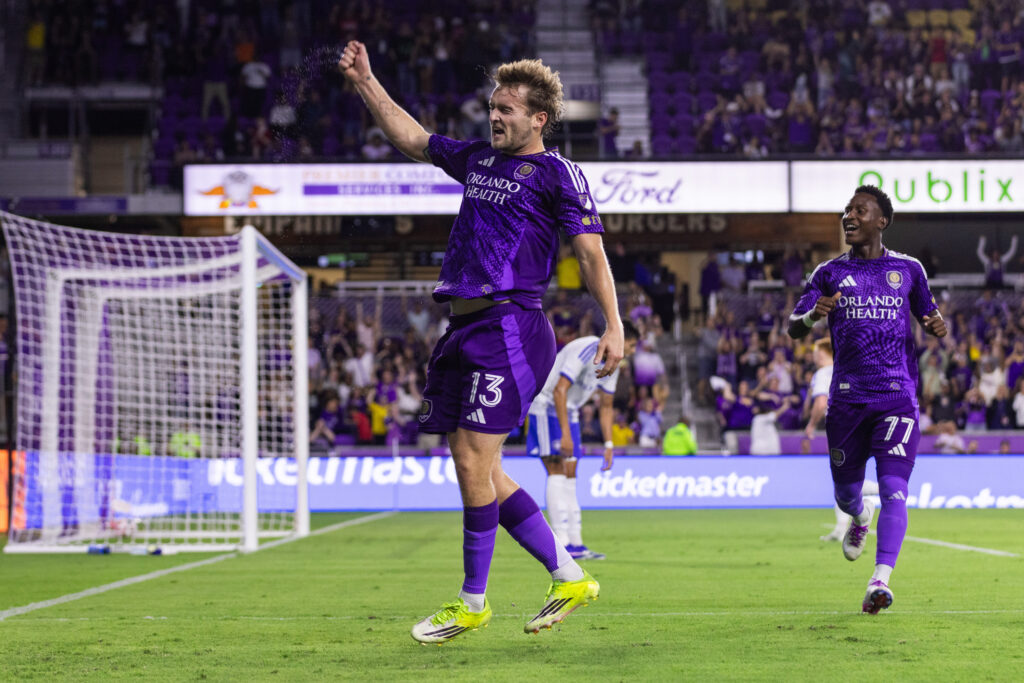 Duncan McGuire #13 of Orlando City celebrates his goal