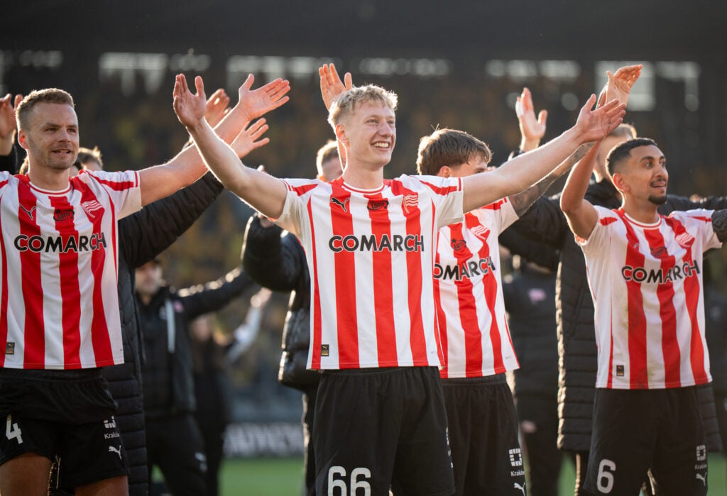 Oskar Wojcik and his teammates celebrate victory in the game between KS Cracovia and GKS Katowice in Krakow, Poland,