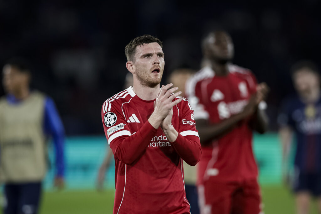 Andy Robertson of Liverpool thanks supporters for standing during the UEFA Champions League 2025/26 Quarter-Final First Leg match between Paris-Saint-Germain FC and Liverpool FC