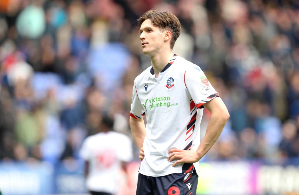 Johnny Kenny looks on for Bolton Wanderers against Huddersfield Town in Sky Bet League One.