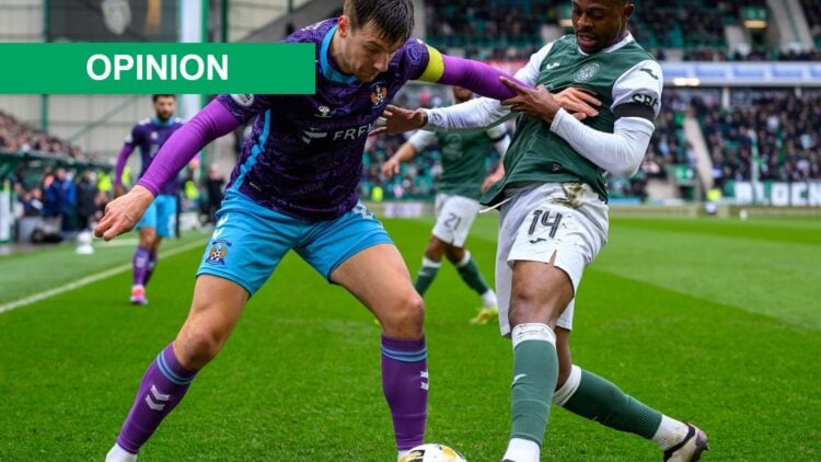 Brad Lyons (L) of Kilmarnock holds off Miguel Chaiwa of Hibs during the William Hill Premiership match between Hibernian and Kilmarnock